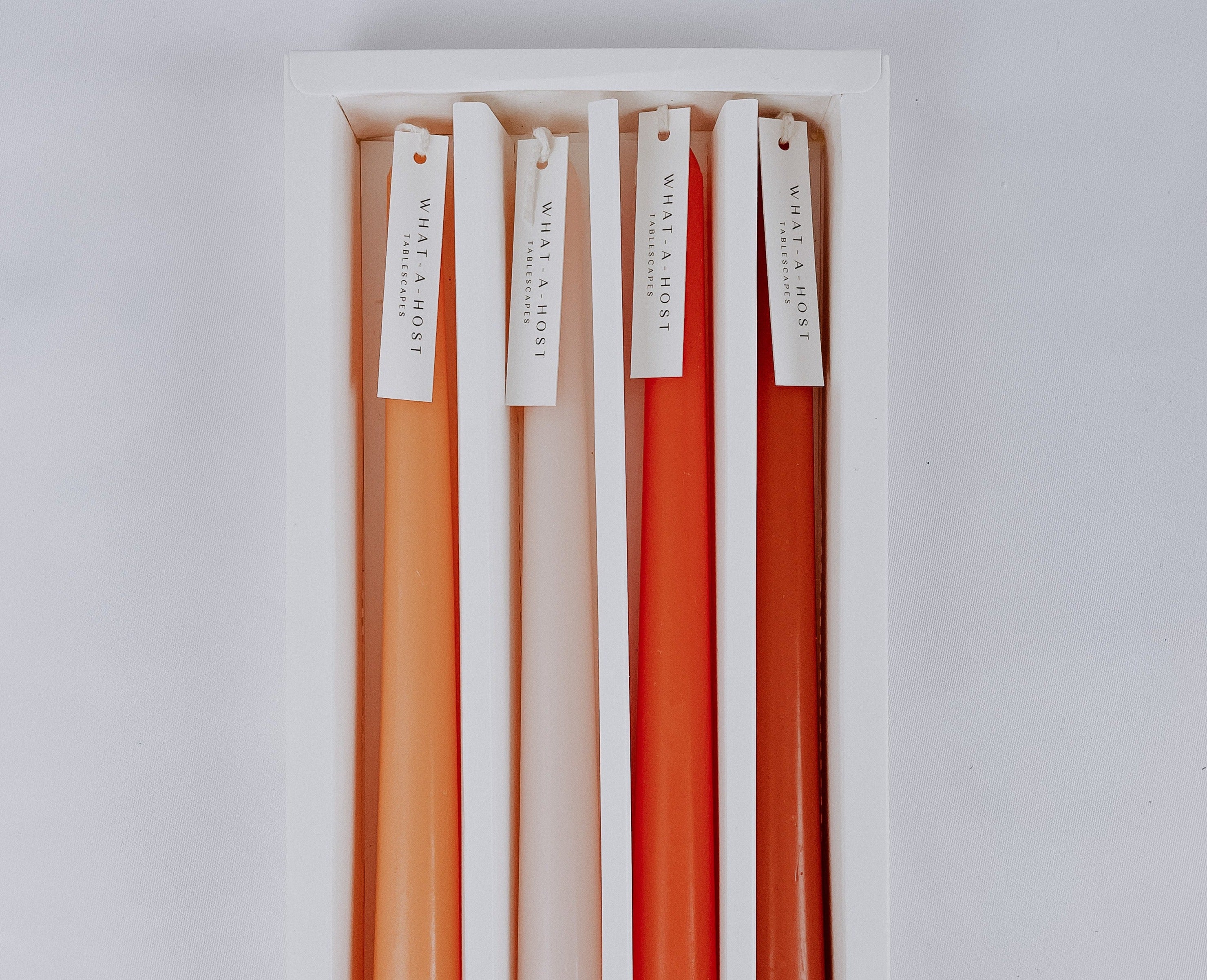 Orange Scented Taper Candles from What a Host Home Decor